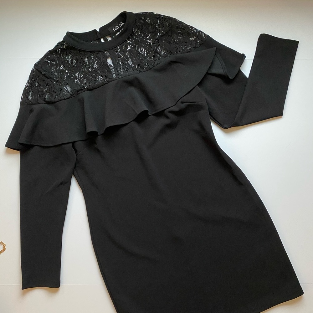 Black Mini Dress. Lace and ruffle details.
